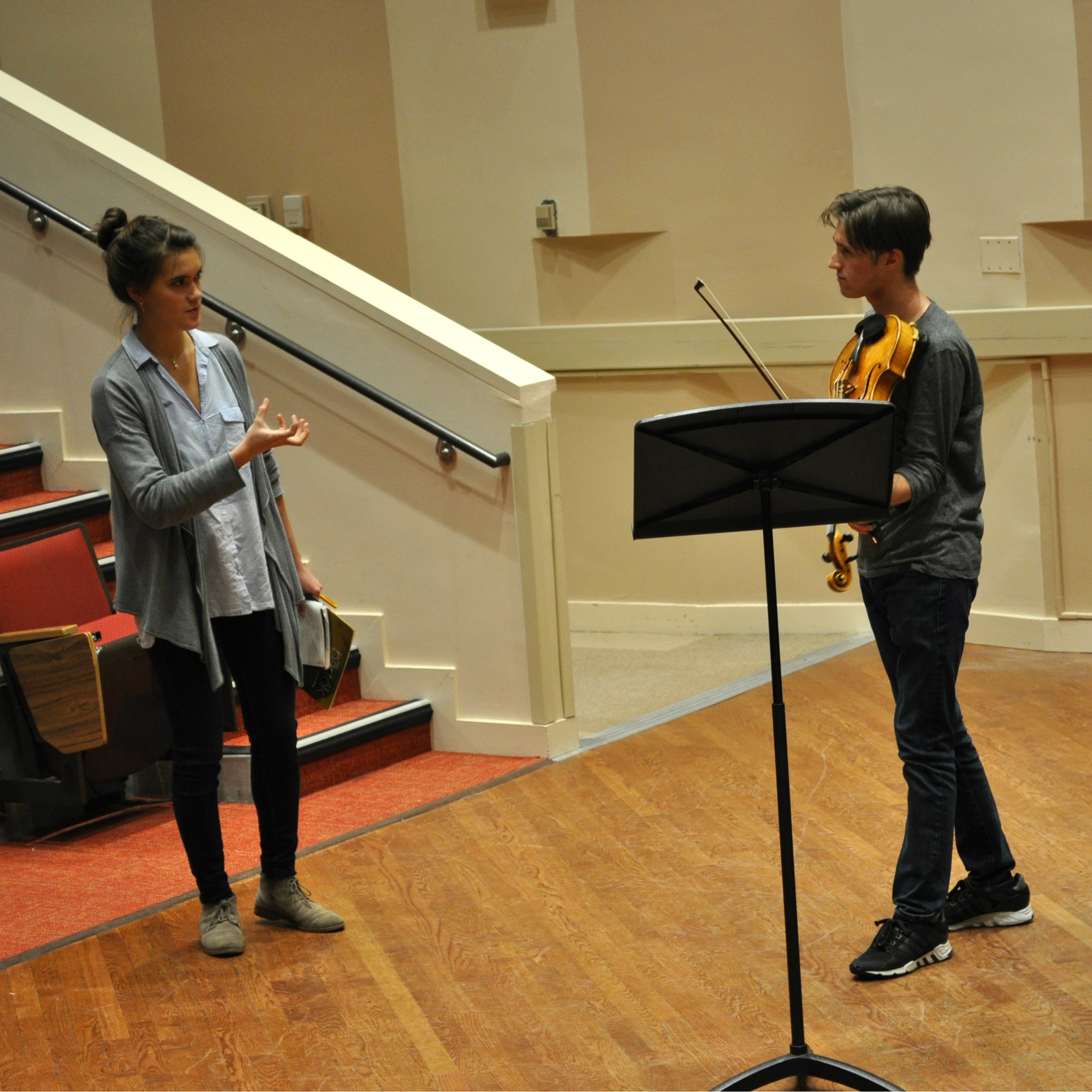 Chloe works with Derrick in a masterclass.
