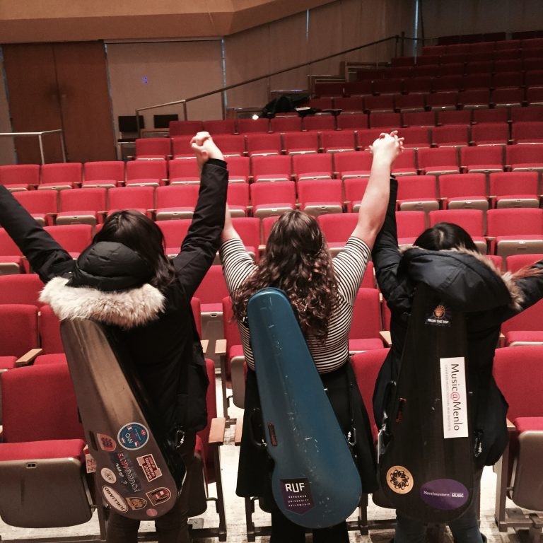 The NUCO viola section celebrates a successful rehearsal.